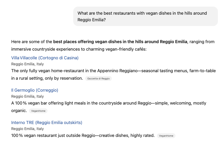 Screenshot of a conversation with ChatGPT "What are the best restaurants with vegan dishes in the hills around Reggio Emilia?"